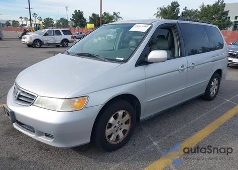 2003 Honda Odyssey Ex-L z USA, uszkodzony, nr VIN 5FNRL18933B117892